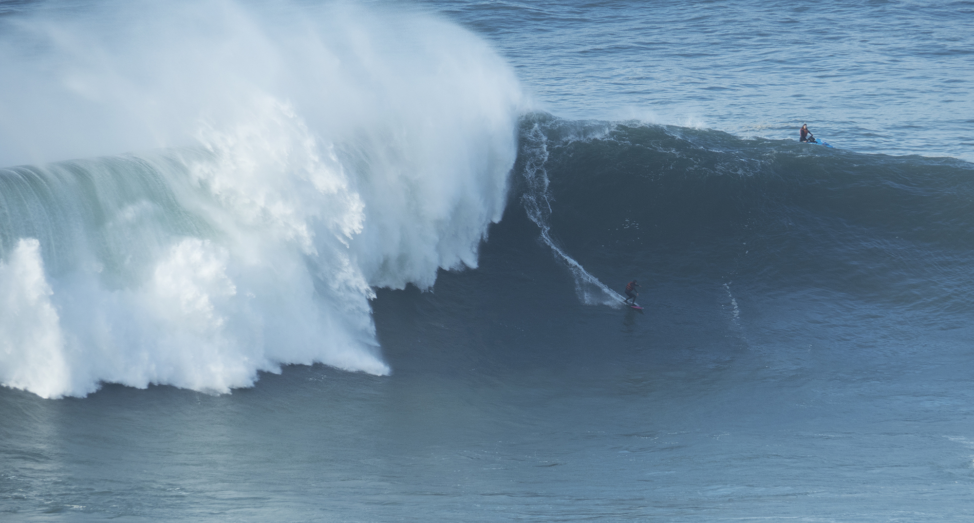Big-wave surfer at Praia do Norte