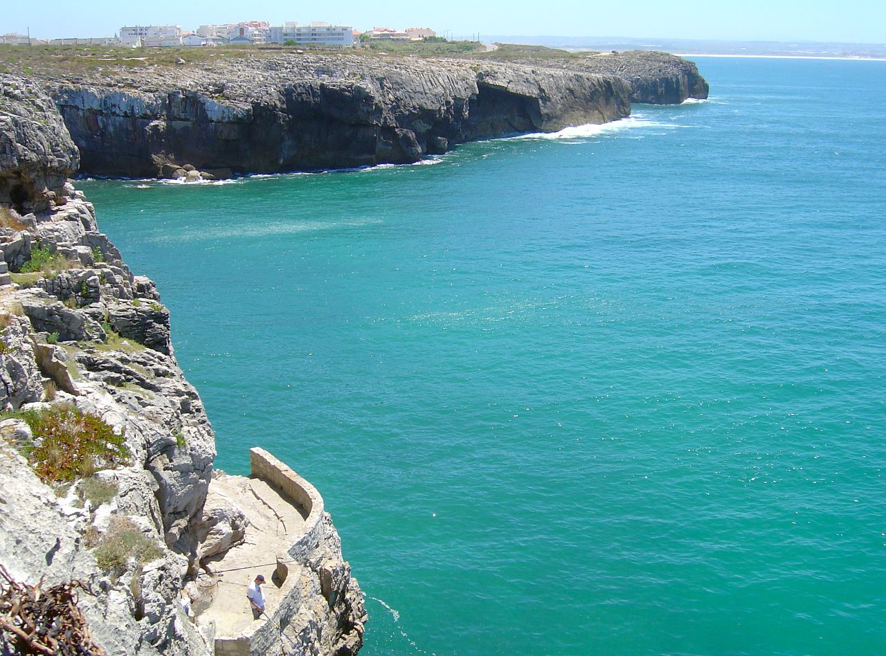 Jurassic limestone cliffs along the Peniche peninsula's outer coast